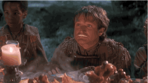 Robin Williams getting hit in the face with "imaginary" food that manifests into something real for the scene. From the movie Hook.